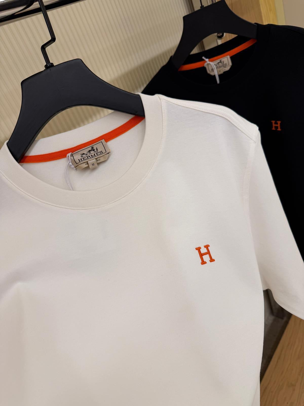 White T-shirt with Orange Logo