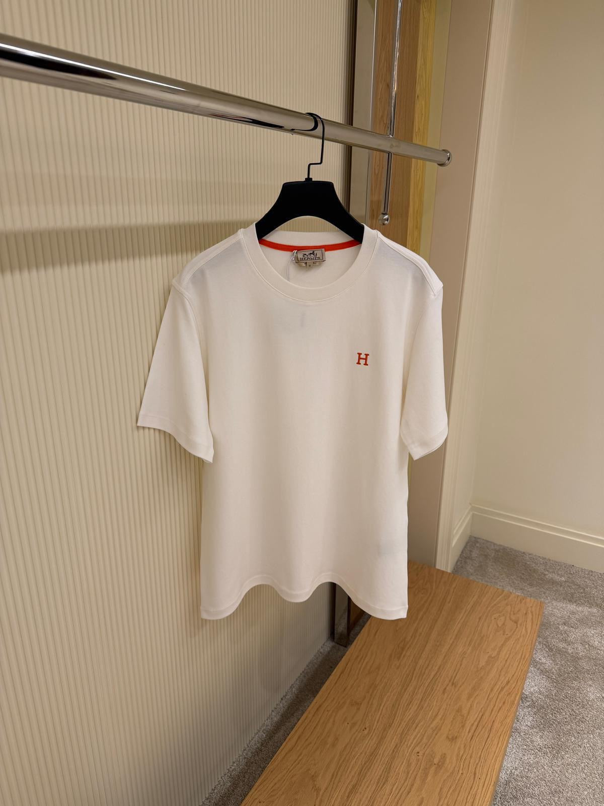 White T-shirt with Orange Logo